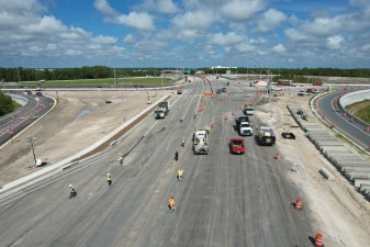 The SR 56 roadway is busy with workers making the conversion to the Diverging Diamond Interchange traffic pattern (5/1/2022 photo)