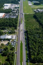 Looking north over US 19 towards W Venable Street and the Crystal River / Captain Tom Davis Field Airport (7-8-2024 photo)