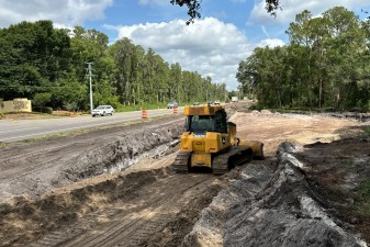 Placing good soil in an area where unsuitable soils were removed on the east side of US 98 at Big Cypress Blvd. (6-10-2024 photo)